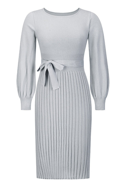Light gray ribbed dress with a belt on a white background