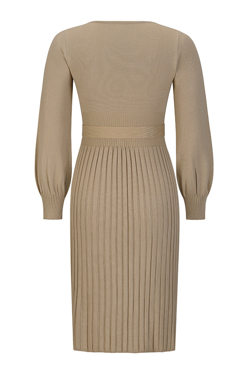 Beige ribbed dress with long sleeves on a white background