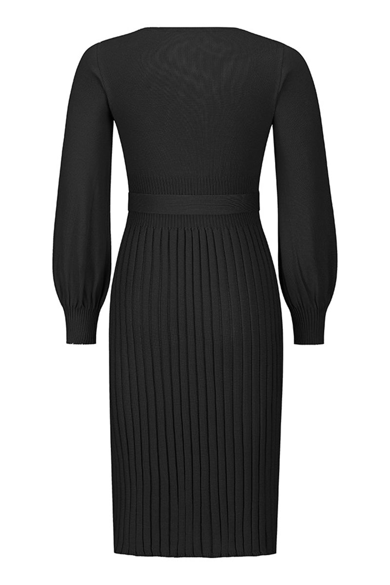 Black pleated dress with long sleeves on a white background