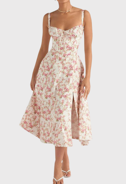 Woman wearing a floral dress on a white background