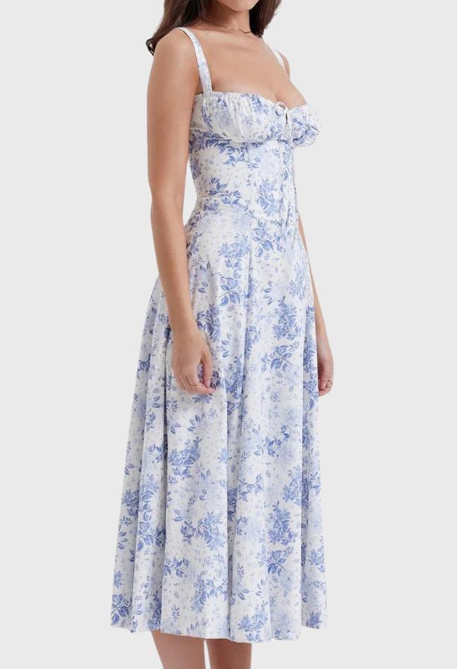 Woman wearing a floral dress on a white background