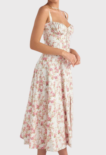 Woman wearing a floral dress on a white background