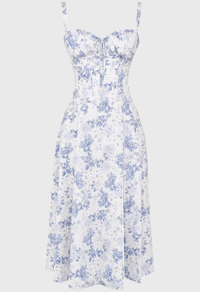 White strapless dress with blue floral pattern on a white background