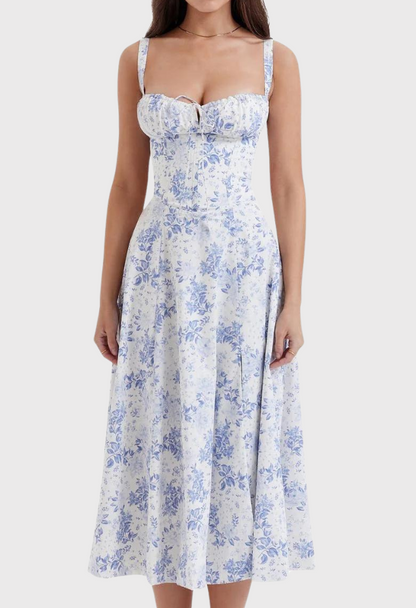Woman wearing a floral dress with a white background