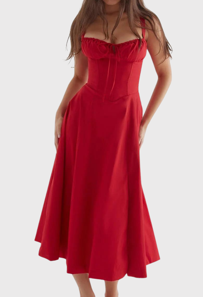Red dress worn by a model on a white background