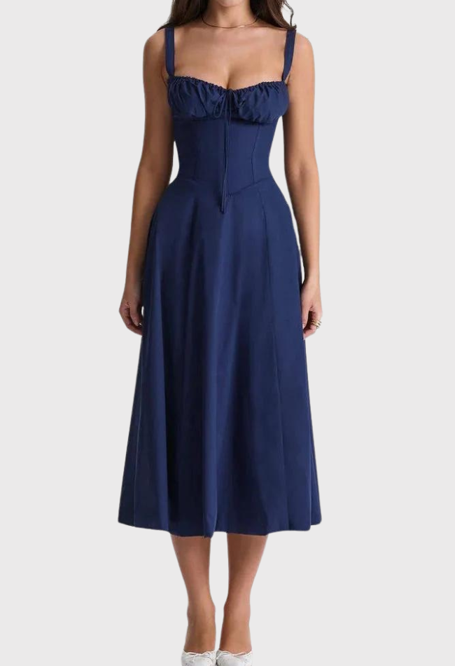 Navy blue dress worn by a model on a white background