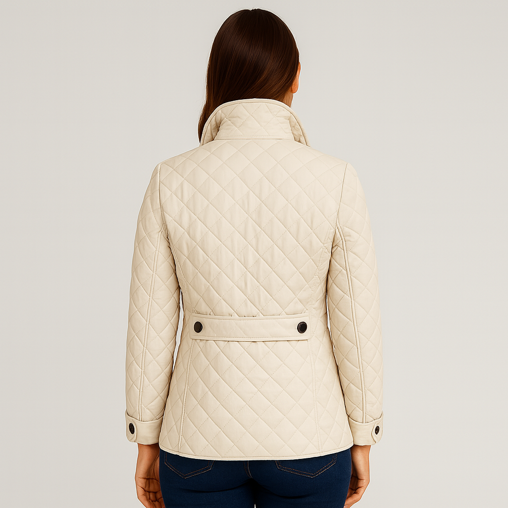 Beige quilted jacket worn by a person on a light gray background